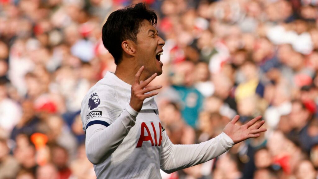 Son Heung-min celebrates after drawing Tottenham level for a second time at Arsenal (David Cliff/AP)